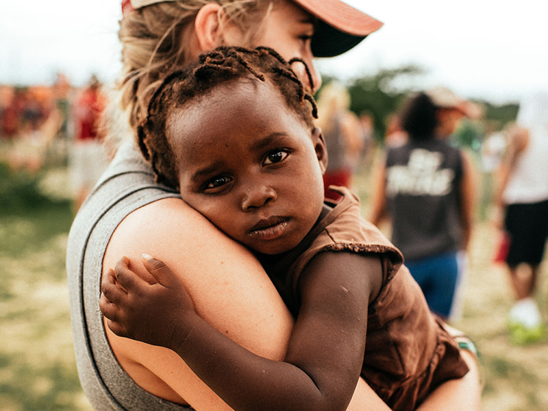 Person Holding a Child 1